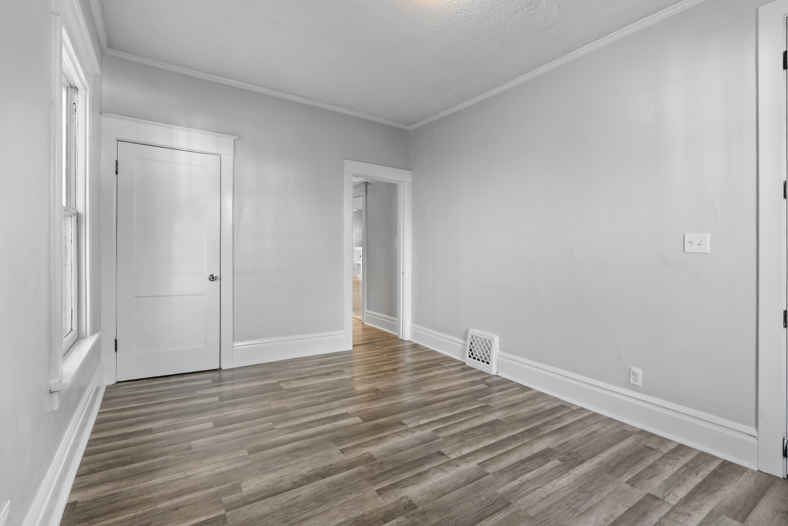 446 Seminary Avenue Aurora, IL 60505 - Photo 15 of 41 a view of an empty room with wooden floor