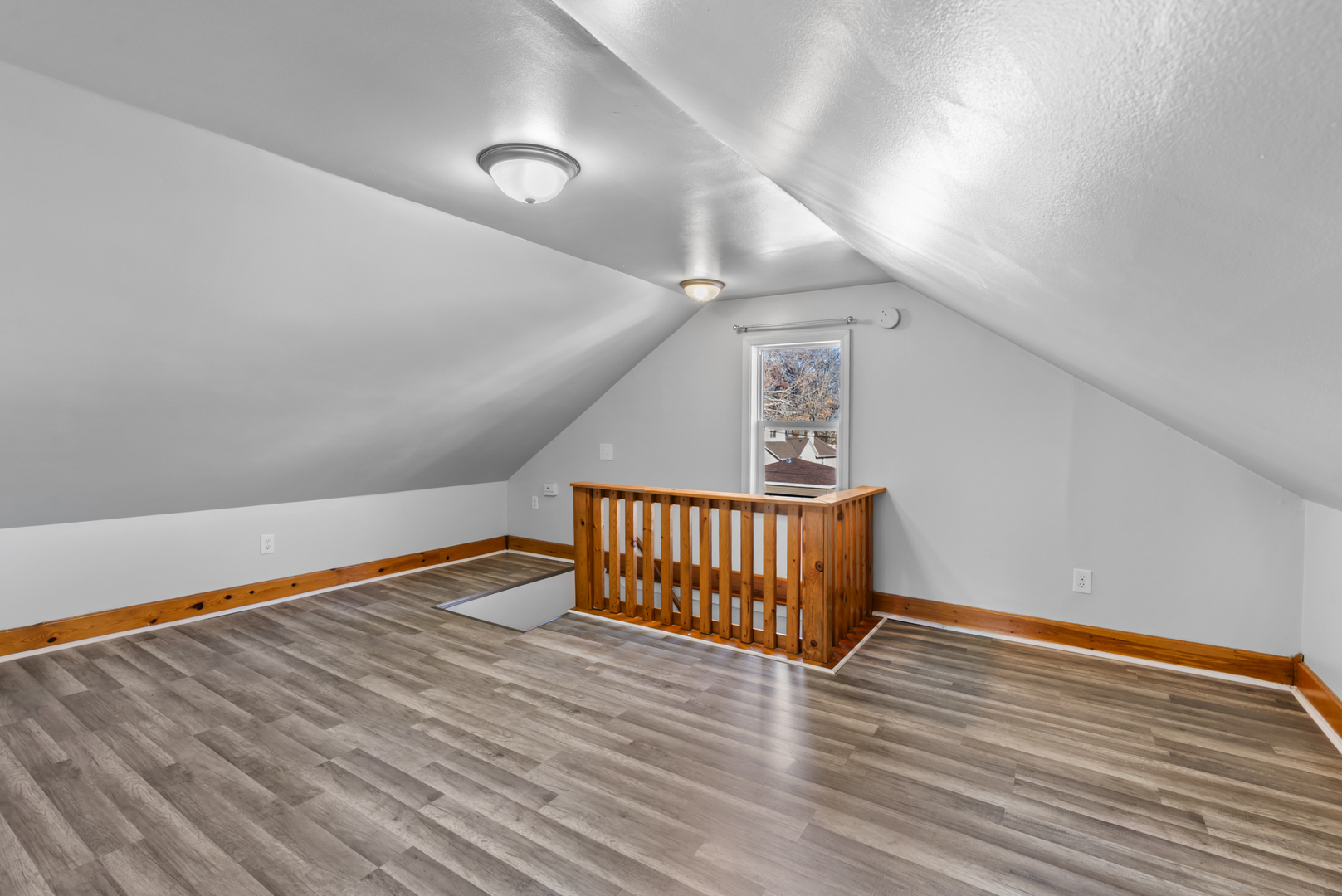 446 Seminary Avenue Aurora, IL 60505 - Photo 17 of 41 a view of an empty room with wooden floor