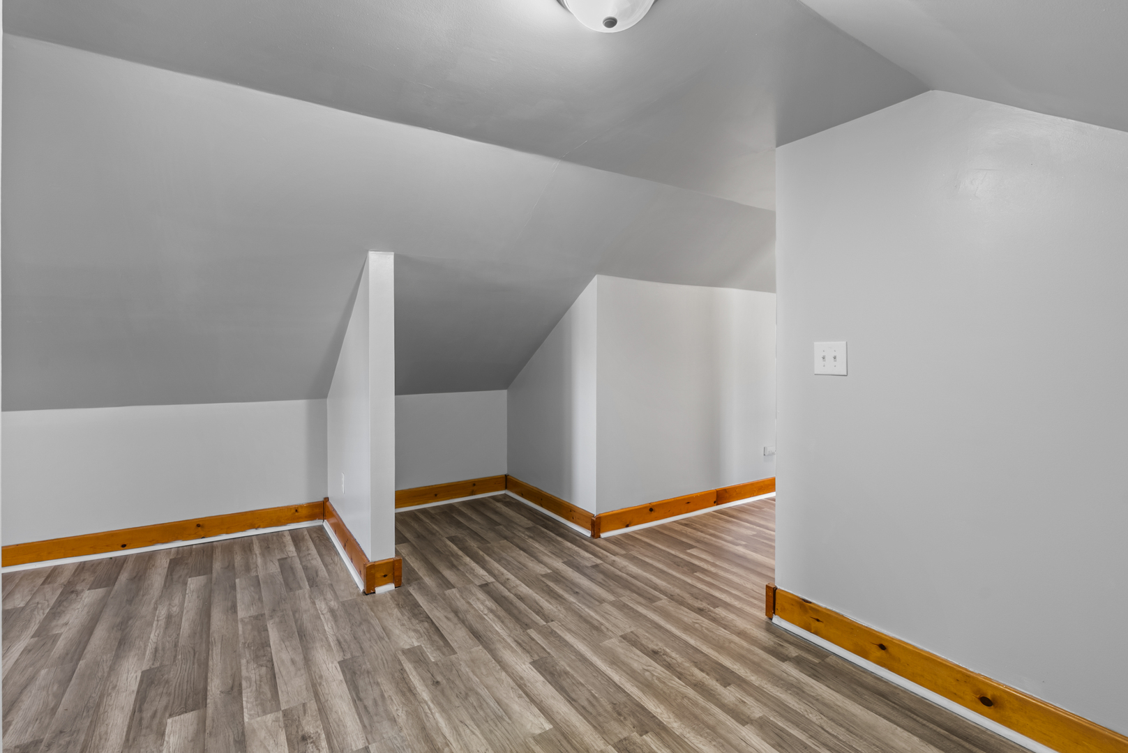 446 Seminary Avenue Aurora, IL 60505 - Photo 19 of 41 a view of an empty room with wooden floor