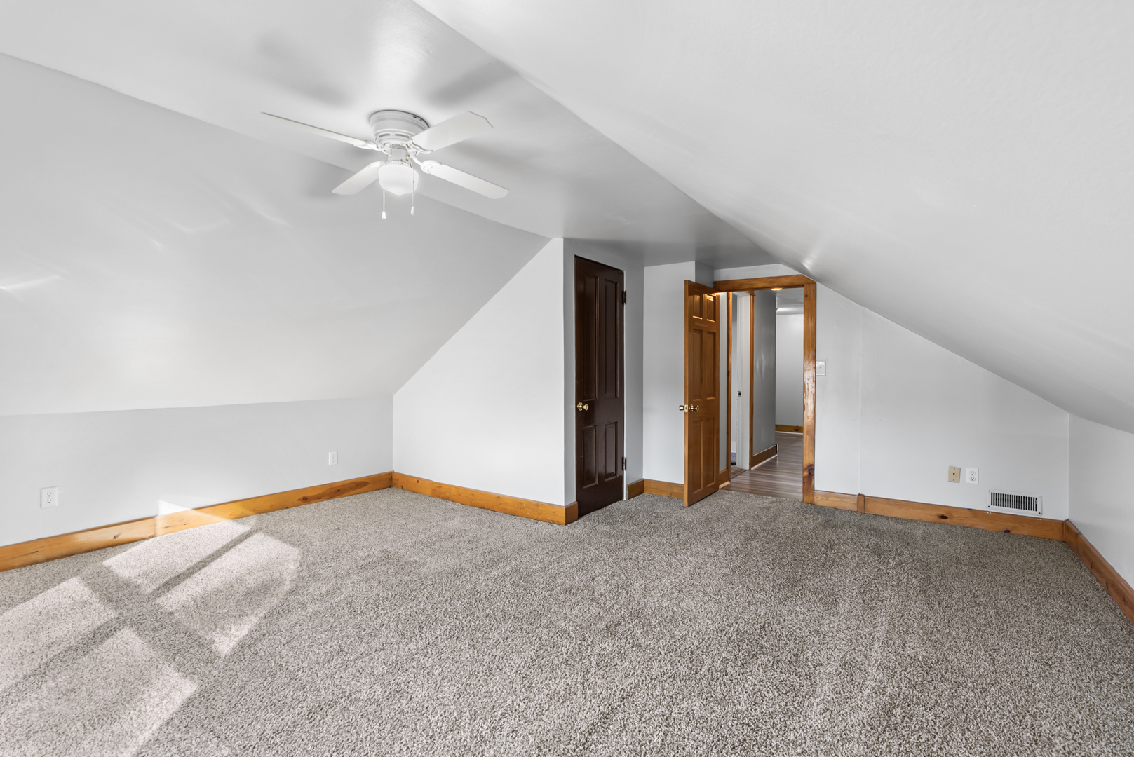 446 Seminary Avenue Aurora, IL 60505 - Photo 24 of 41 a view of an empty room with a ceiling fan
