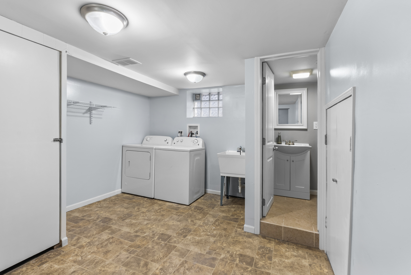 446 Seminary Avenue Aurora, IL 60505 - Photo 27 of 41 a view of a storage & utility room with a sink