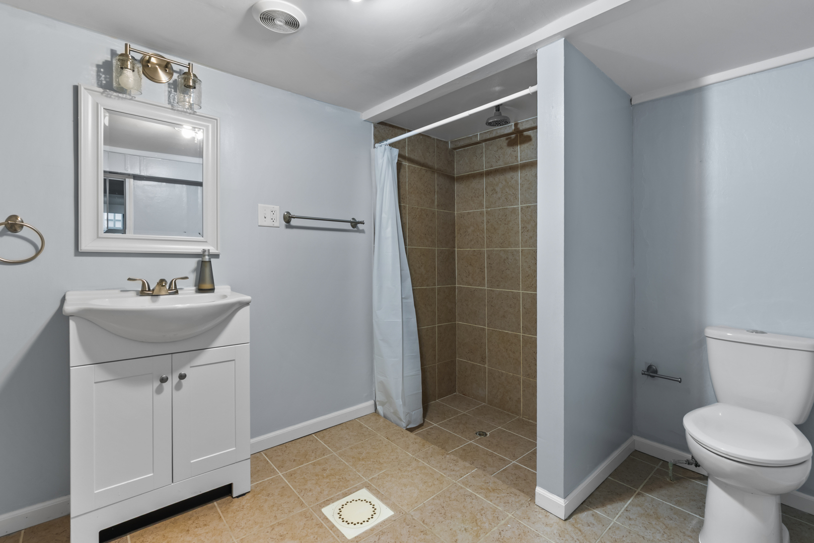 446 Seminary Avenue Aurora, IL 60505 - Photo 35 of 41 a bathroom with a sink toilet and shower