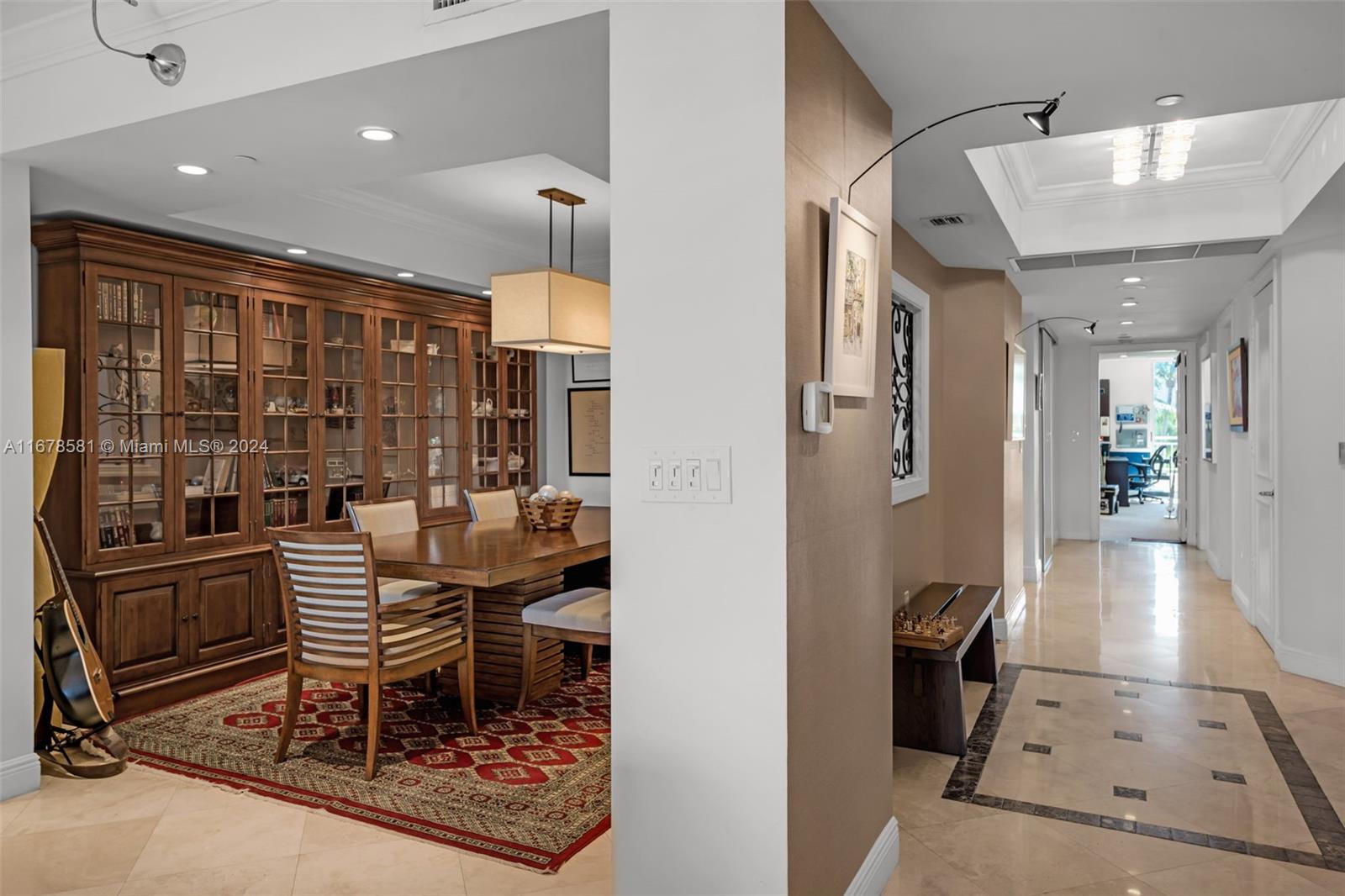 765 Crandon Boulevard, Unit 305 Key Biscayne, FL 33149 - Photo 11 of 55 a living room with furniture