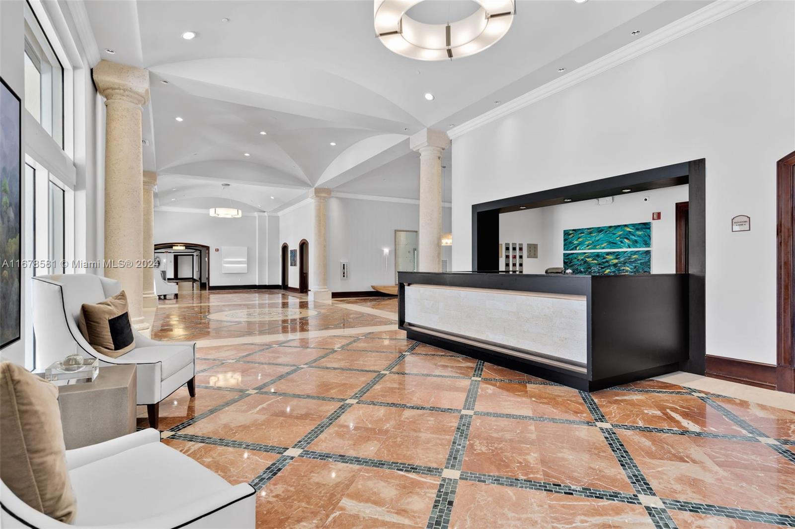 765 Crandon Boulevard, Unit 305 Key Biscayne, FL 33149 - Photo 55 of 55 a living room with furniture and a flat screen tv