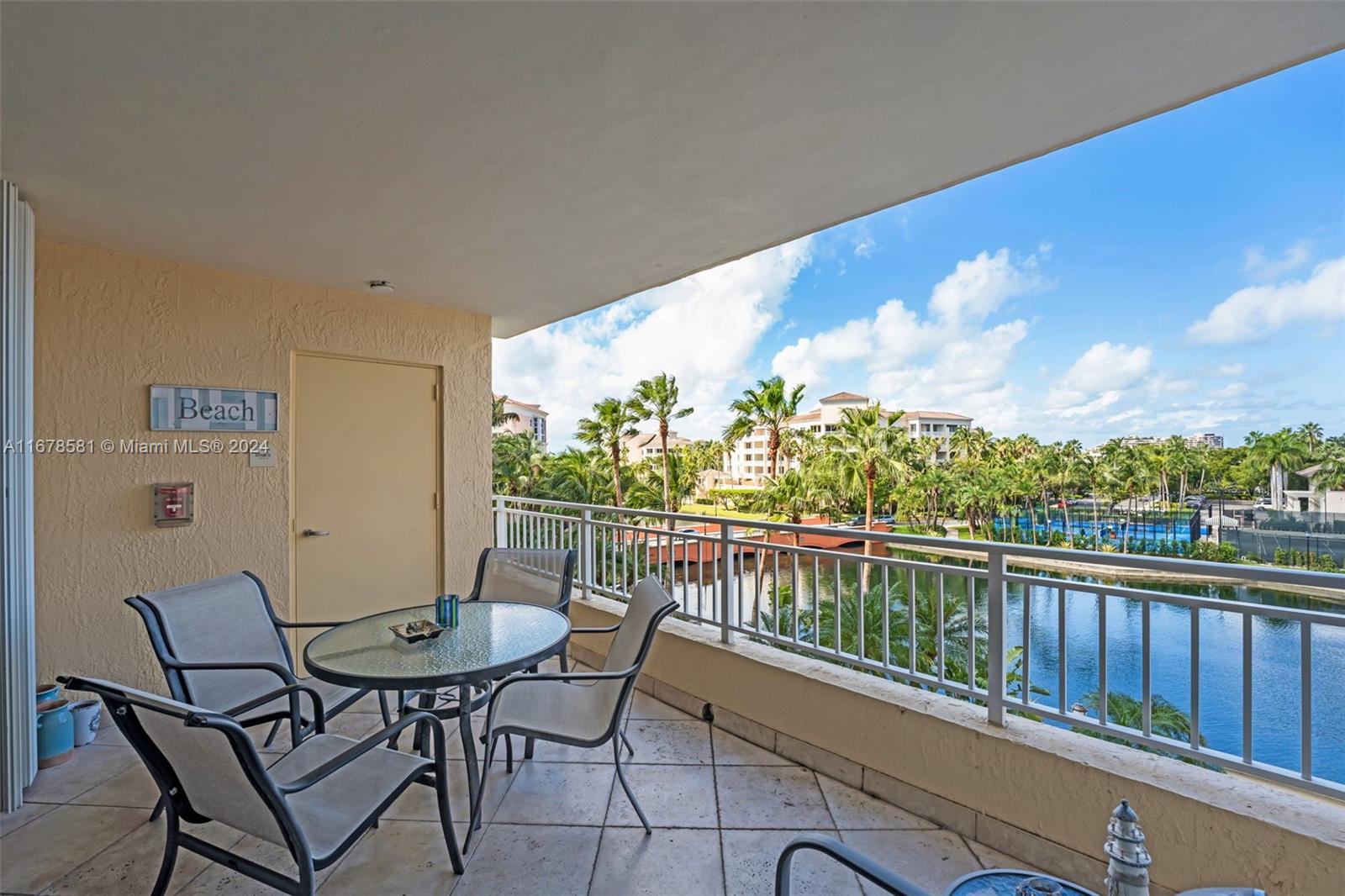 765 Crandon Boulevard, Unit 305 Key Biscayne, FL 33149 - Photo 8 of 55 a view of a balcony with furniture