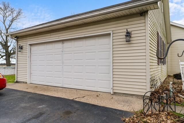 13318 Robin Lane Wheatfield, IN 46392 - Photo 17 of 17 a view of a house with a garage
