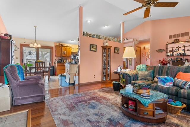 13318 Robin Lane Wheatfield, IN 46392 - Photo 7 of 17 a living room with furniture and a view of kitchen