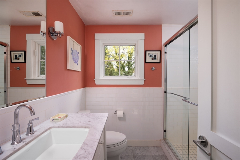 98 Annawan Road Newton, MA 02468 - Photo 18 of 30 a bathroom with a sink toilet and shower