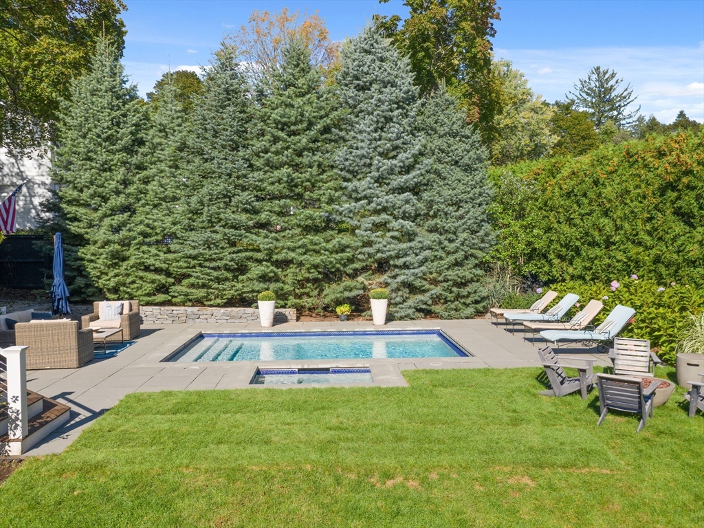 98 Annawan Road Newton, MA 02468 - Photo 23 of 30 an aerial view of a house with swimming pool garden and mountain view