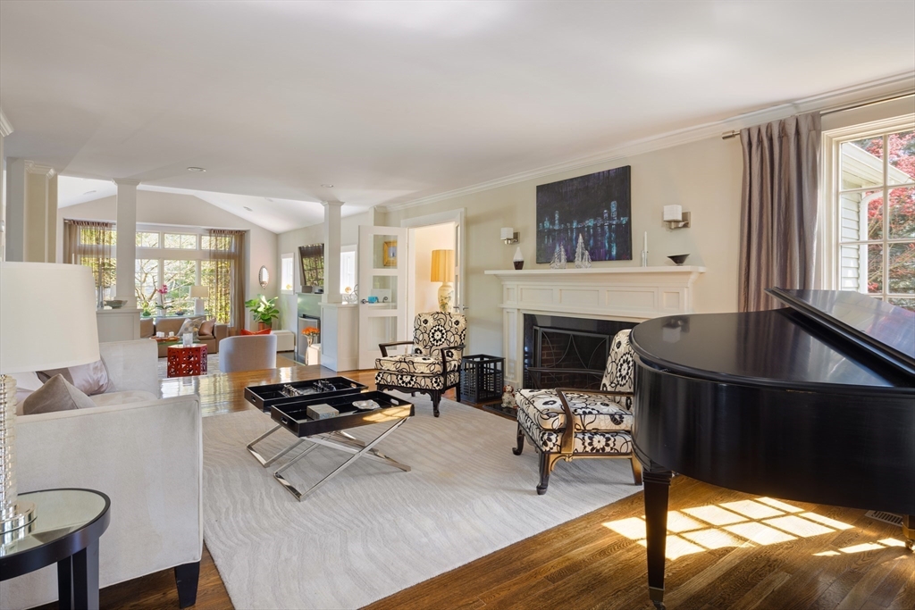 98 Annawan Road Newton, MA 02468 - Photo 8 of 30 a living room with furniture and a fireplace