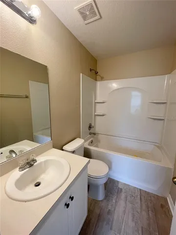 a bathroom with a sink and a bathtub