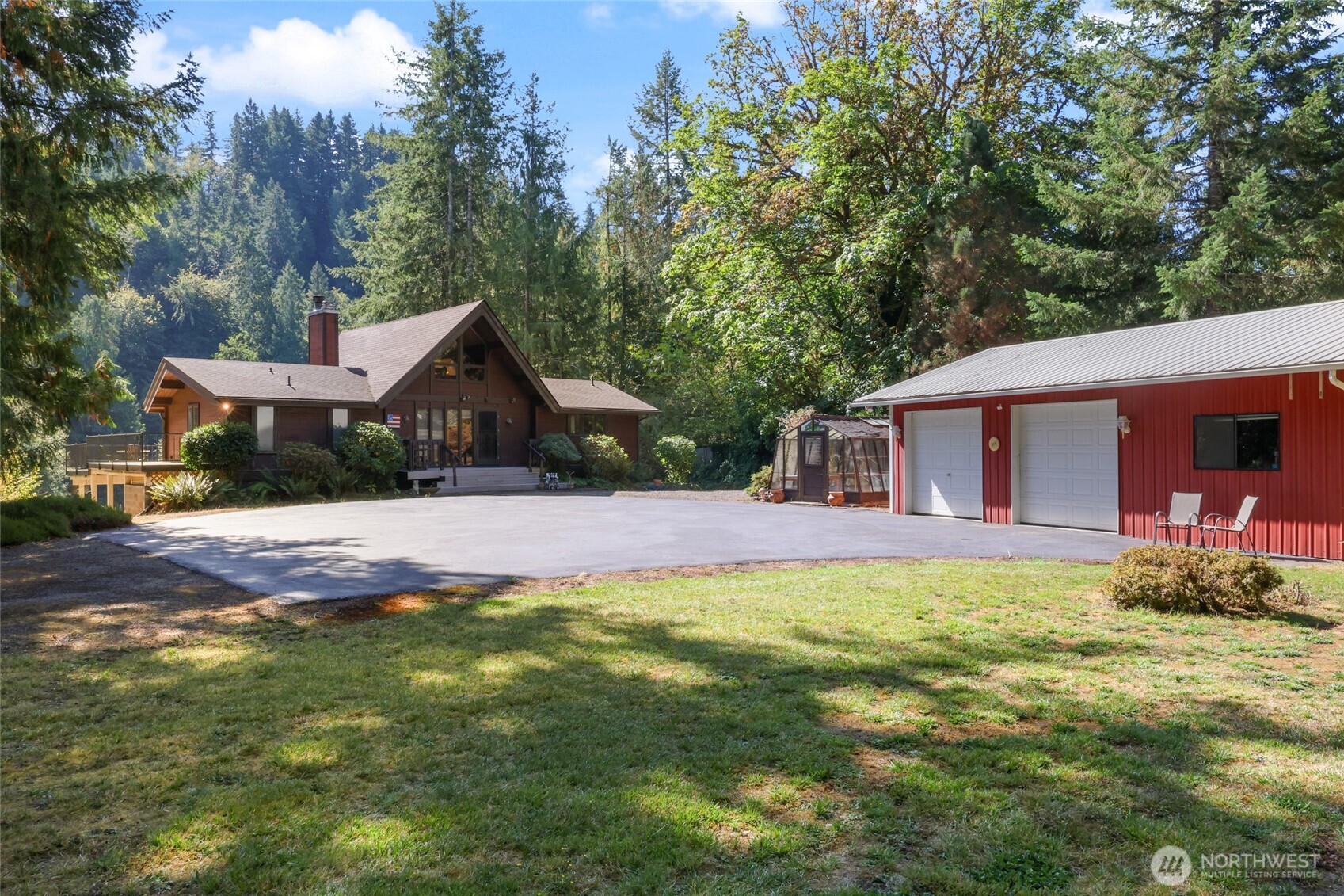 2484 Spencer Road Salkum, WA 98582 - Photo 1 of 36 a front view of house with yard and trees in the background