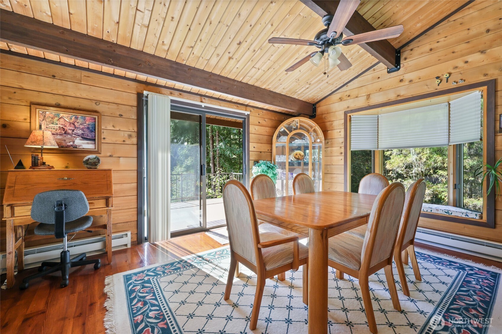 2484 Spencer Road Salkum, WA 98582 - Photo 13 of 36 a dining room with furniture water view and wooden floor