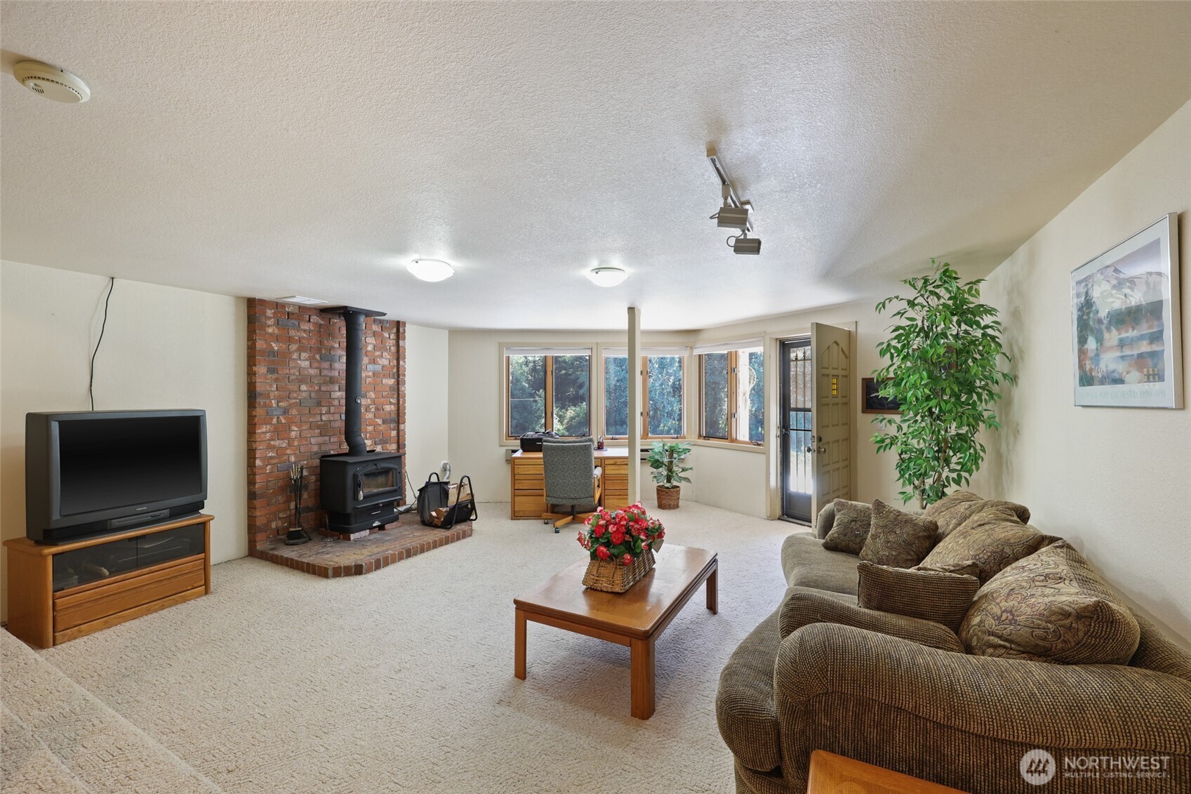 2484 Spencer Road Salkum, WA 98582 - Photo 22 of 36 a living room with furniture and a flat screen tv