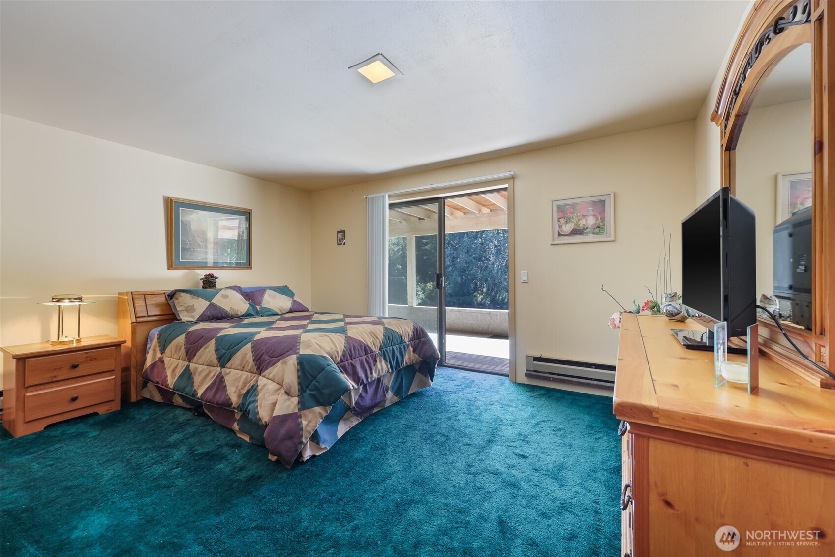 2484 Spencer Road Salkum, WA 98582 - Photo 24 of 36 a bedroom with a bed and large windows