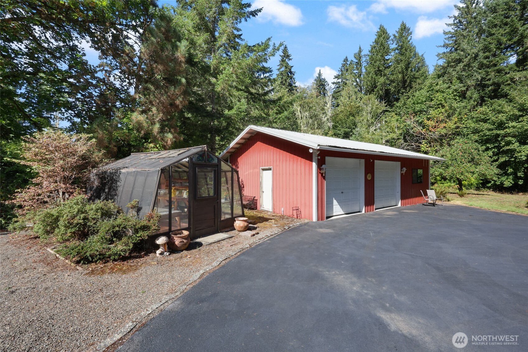 2484 Spencer Road Salkum, WA 98582 - Photo 34 of 36 a view of a house with a yard and large trees