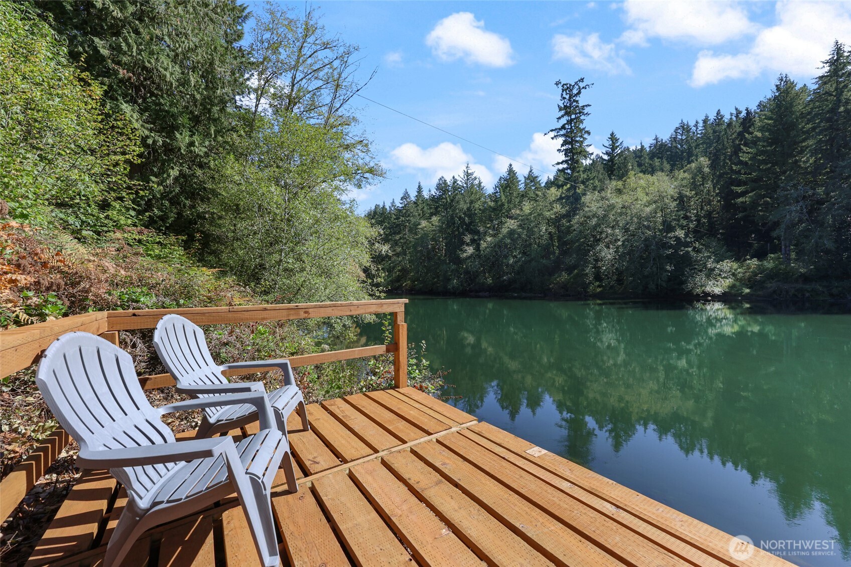 2484 Spencer Road Salkum, WA 98582 - Photo 6 of 36 a view of balcony with wooden floor and outdoor seating