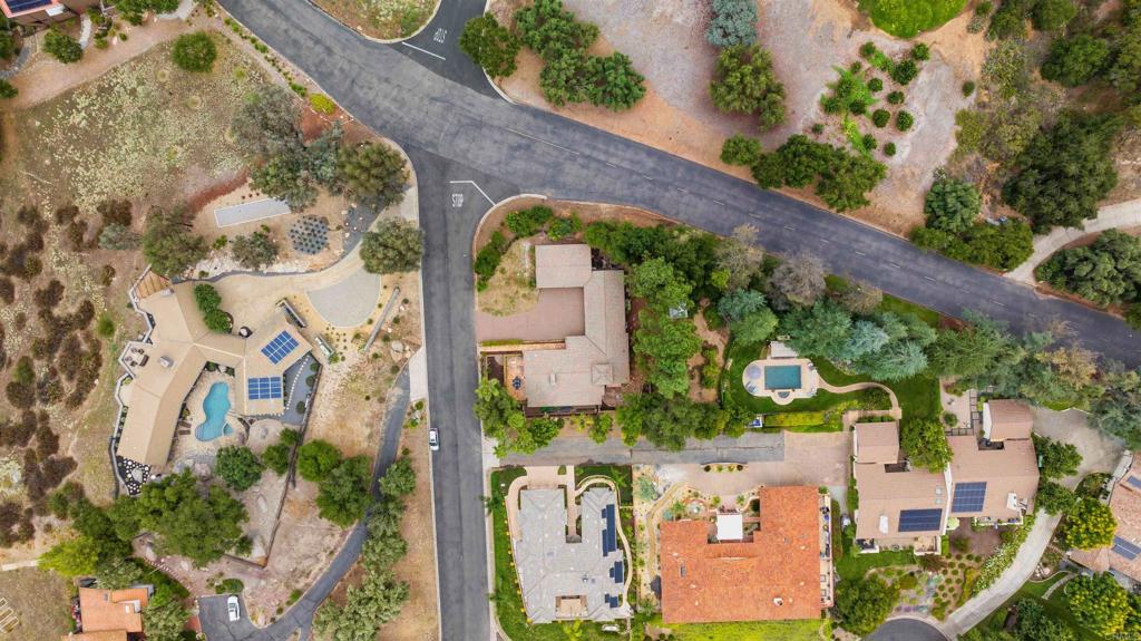 32404 Womsi Road Pauma Valley, CA 92061 - Photo 33 of 34 an aerial view of a house with a yard and large trees