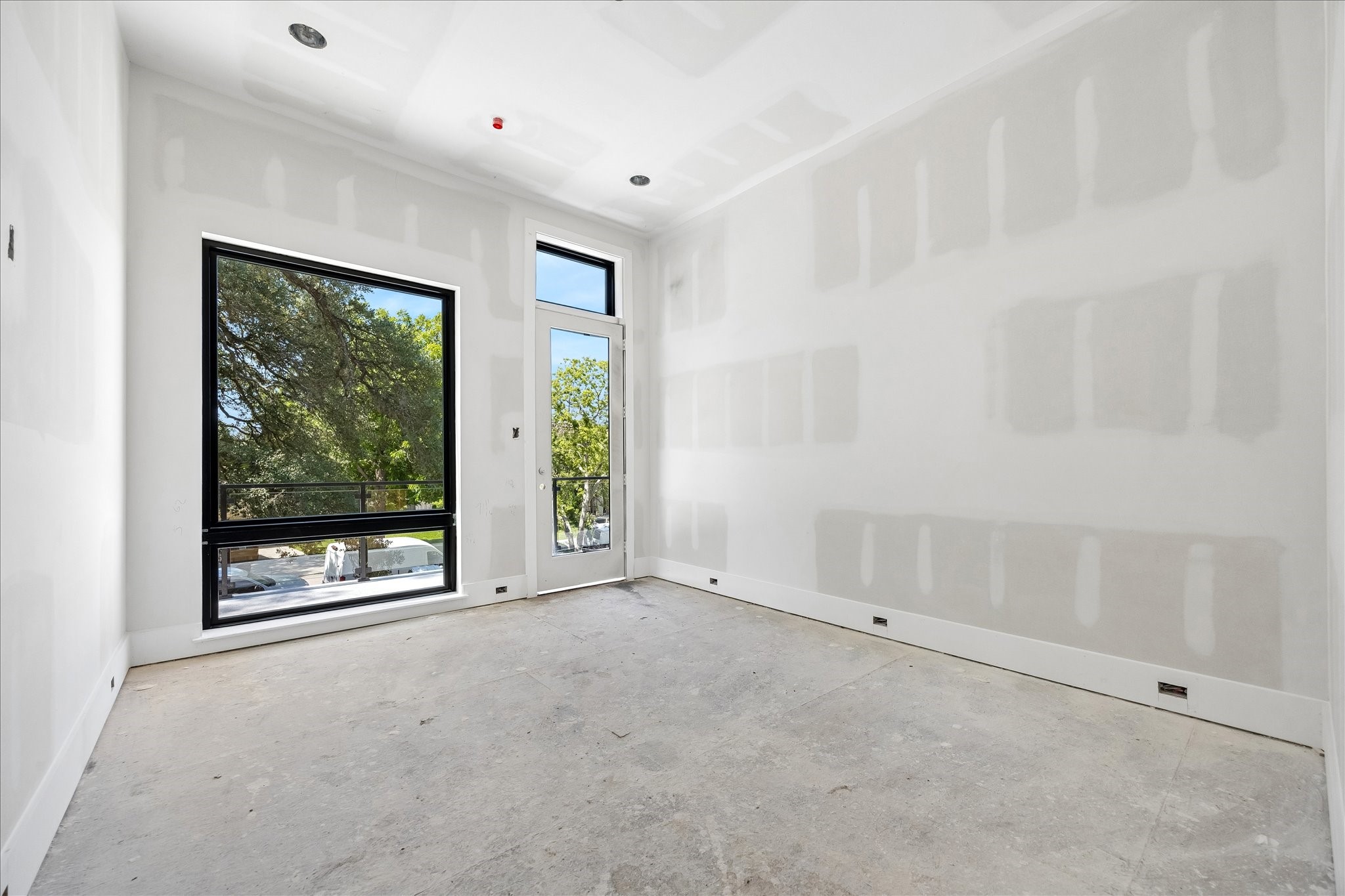 9050 Elizabeth Road Houston, TX 77055 - Photo 28 of 40 a view of an empty room with a window