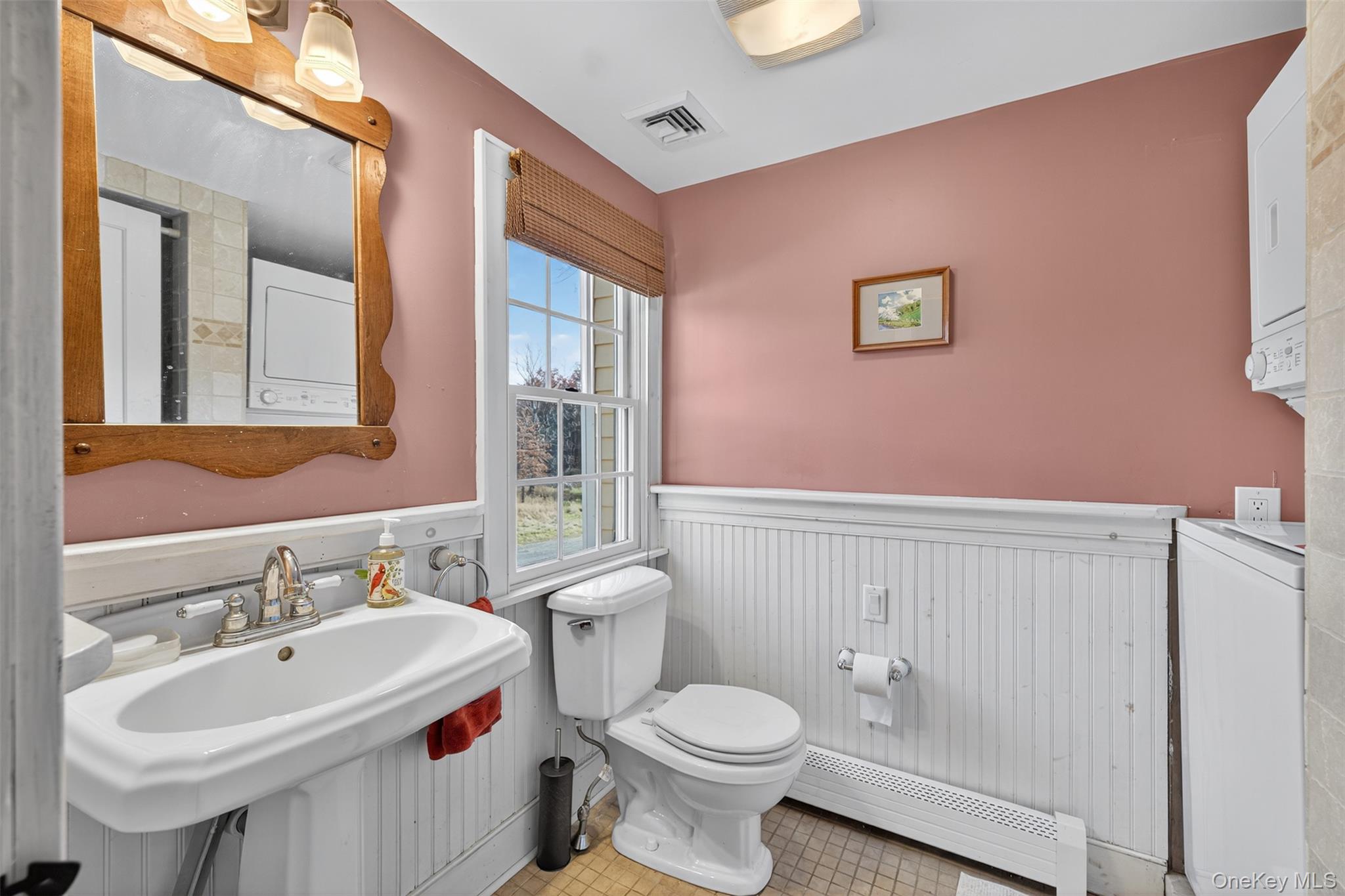 321 Burnt Meadow Road Gardiner, NY 12525 - Photo 18 of 46 a bathroom with a sink mirror and toilet