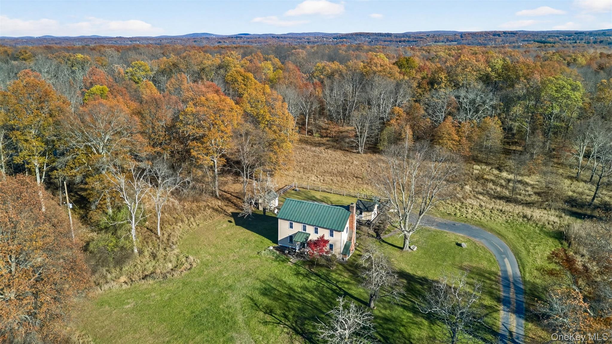 321 Burnt Meadow Road Gardiner, NY 12525 - Photo 39 of 46 a view of a lake with a mountain in the background