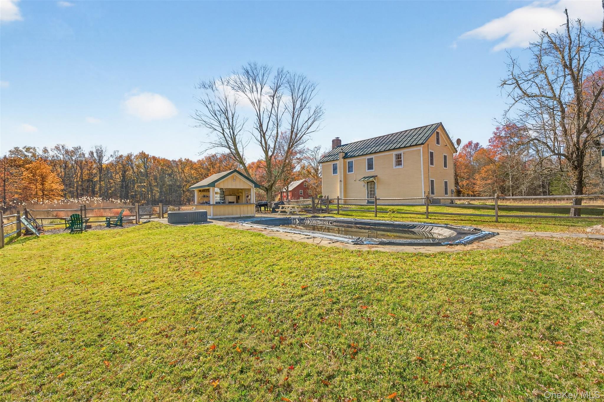 321 Burnt Meadow Road Gardiner, NY 12525 - Photo 42 of 46 a view of swimming pool with an outdoor space and seating area