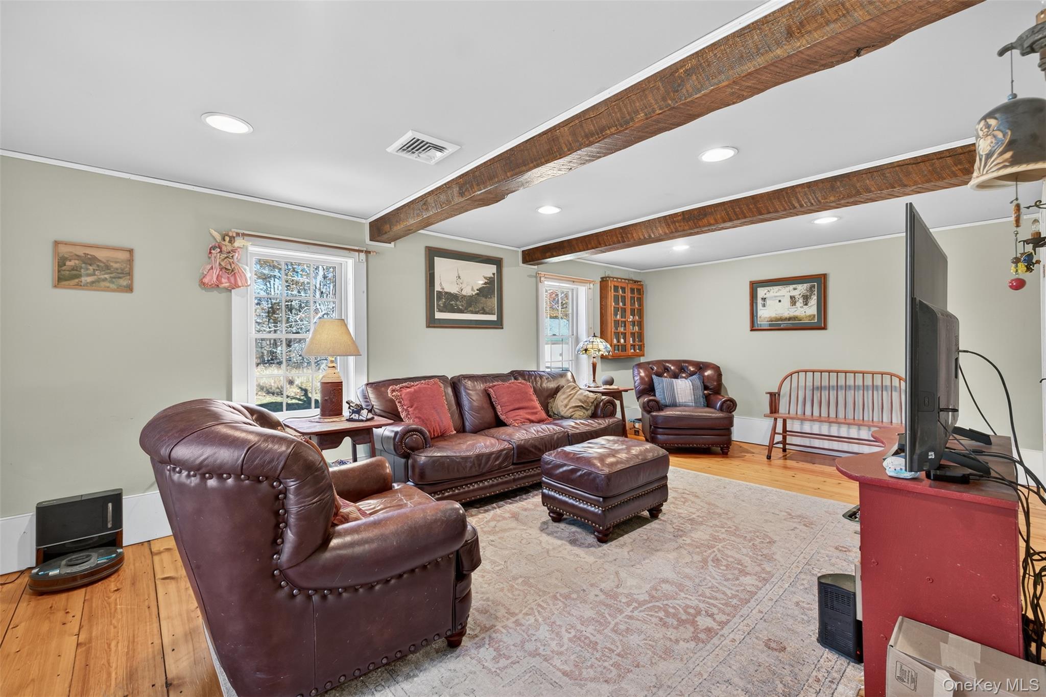 321 Burnt Meadow Road Gardiner, NY 12525 - Photo 6 of 46 a living room with furniture window and a flat screen tv