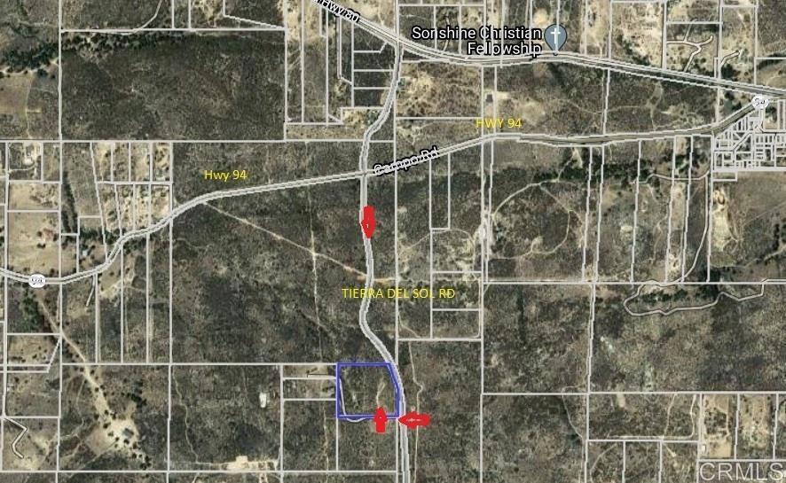 1890 Tierra Del Sol Road Boulevard, CA 91905 - Photo 2 of 2 a view of a glass door with a glass door