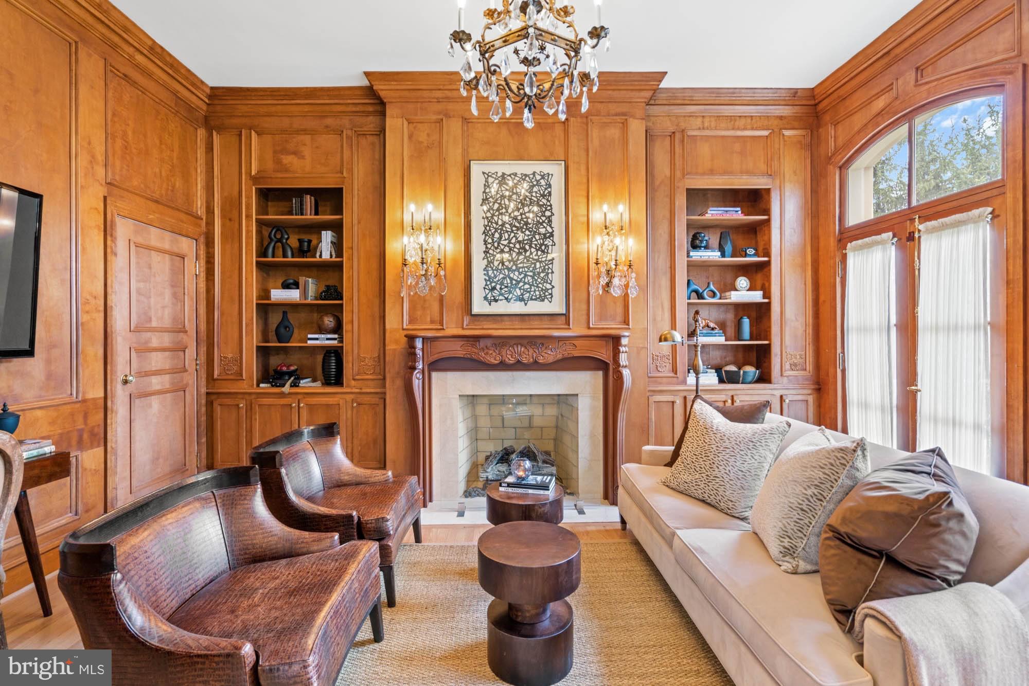 1198 Windrock Drive McLean, VA 22102 - Photo 20 of 83 a living room with furniture a fireplace and large windows