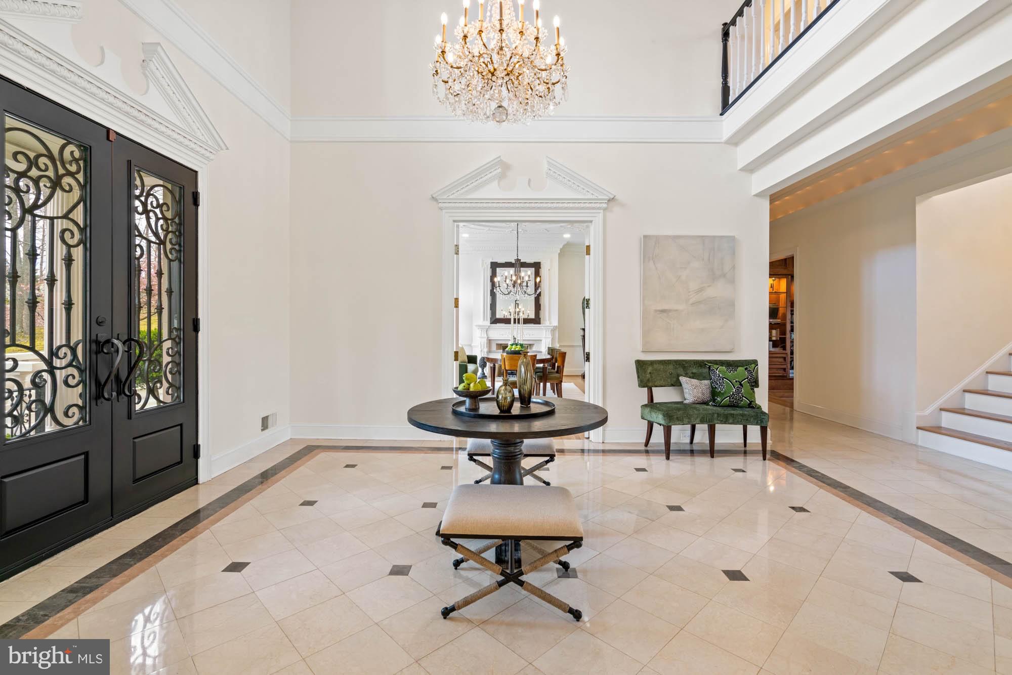 1198 Windrock Drive McLean, VA 22102 - Photo 23 of 83 a view of a hallway with furniture and a chandelier