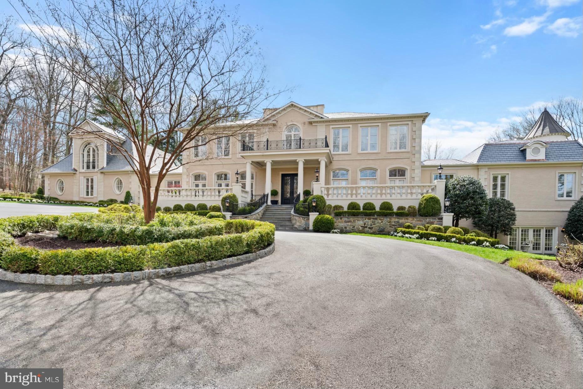 1198 Windrock Drive McLean, VA 22102 - Photo 3 of 83 a front view of a house with a yard and potted plants