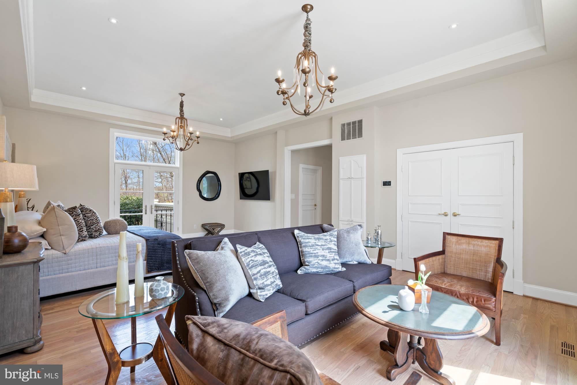 1198 Windrock Drive McLean, VA 22102 - Photo 38 of 83 a living room with furniture chandelier and a table