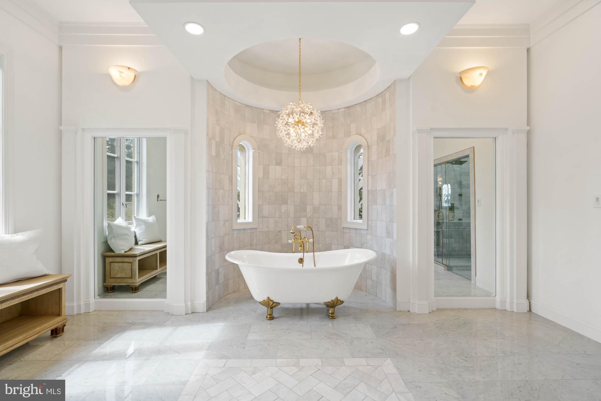 1198 Windrock Drive McLean, VA 22102 - Photo 41 of 83 a spacious bathroom with a sink a large mirror and a shower