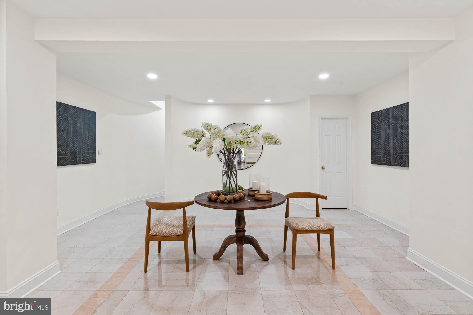 1198 Windrock Drive McLean, VA 22102 - Photo 58 of 83 a view of a livingroom with furniture and a potted plant