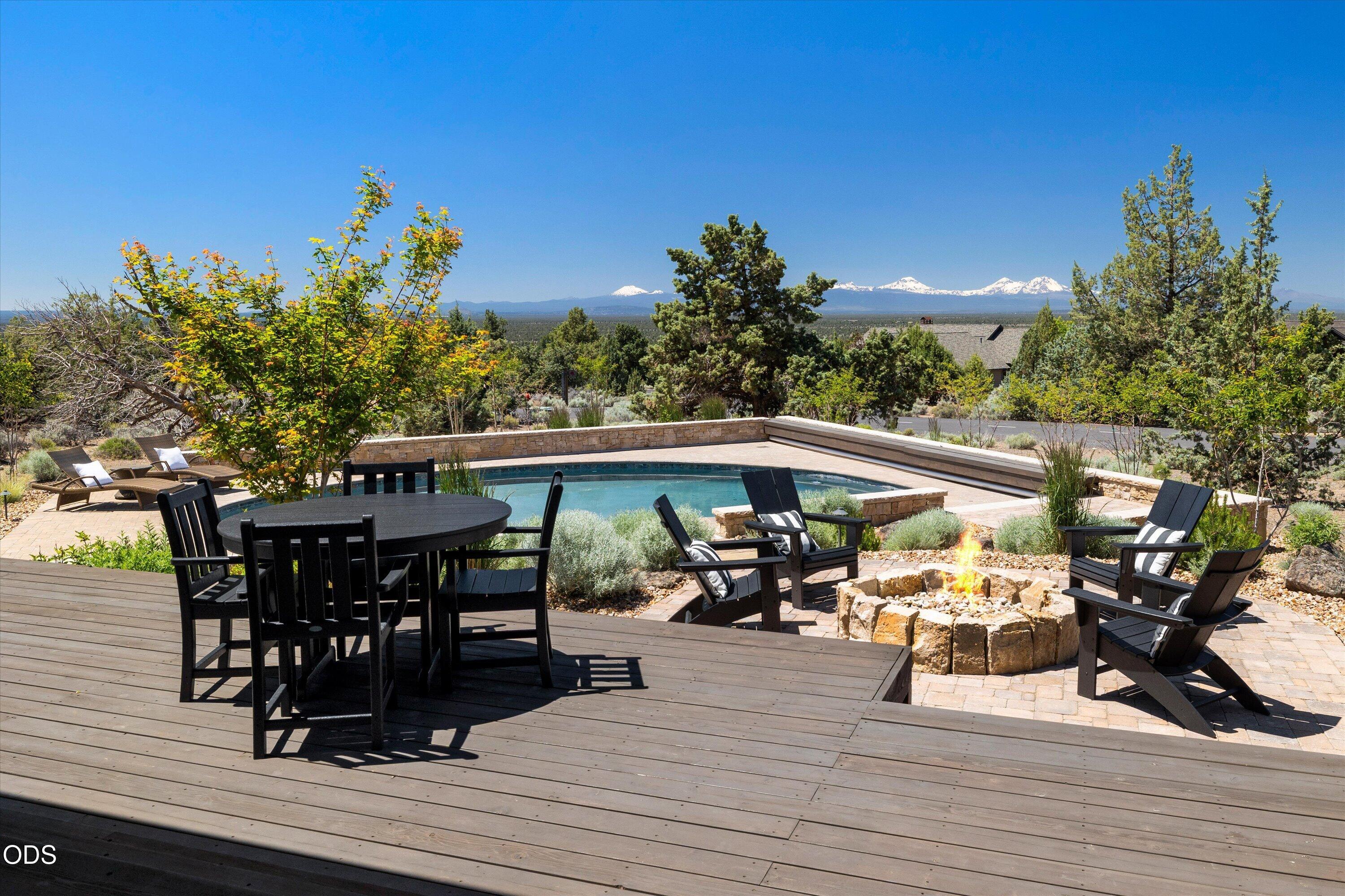 16215 South W Vaqueros Way Powell Butte, OR 97753 - Photo 40 of 48 Uncovered area of back deck offers all-day sunshine