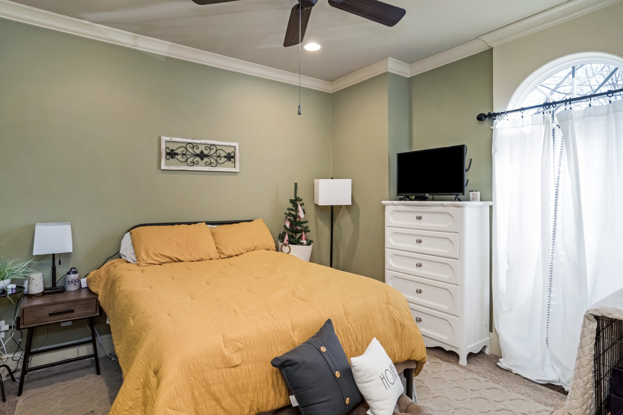 1629 Fair House Road Spring Hill, TN 37174 - Photo 20 of 42 a bedroom with a bed and a flat screen tv