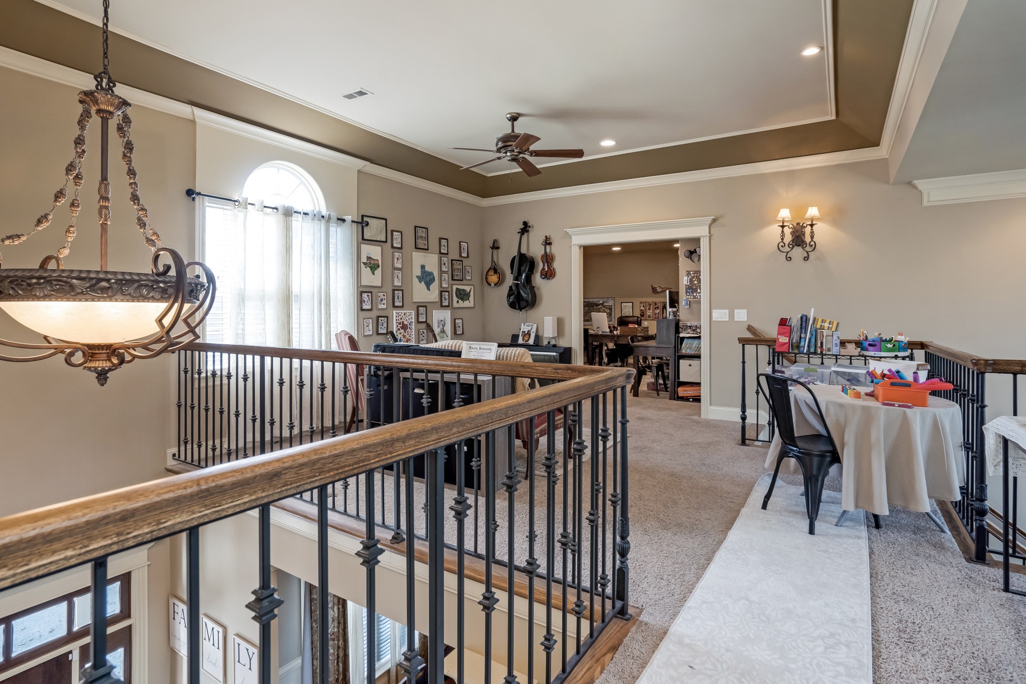 1629 Fair House Road Spring Hill, TN 37174 - Photo 25 of 42 a view of a hallway with dining room and furniture