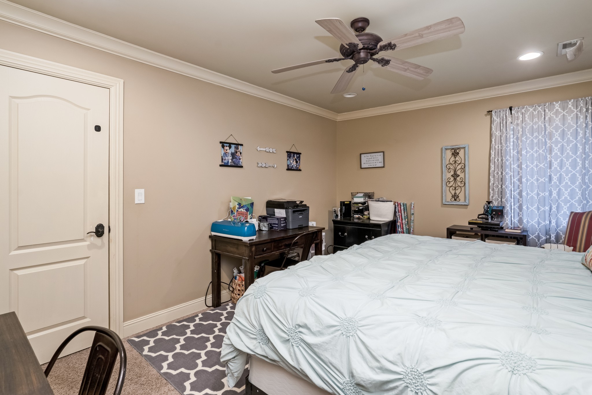 1629 Fair House Road Spring Hill, TN 37174 - Photo 27 of 42 a bed room with a bed and a chandelier