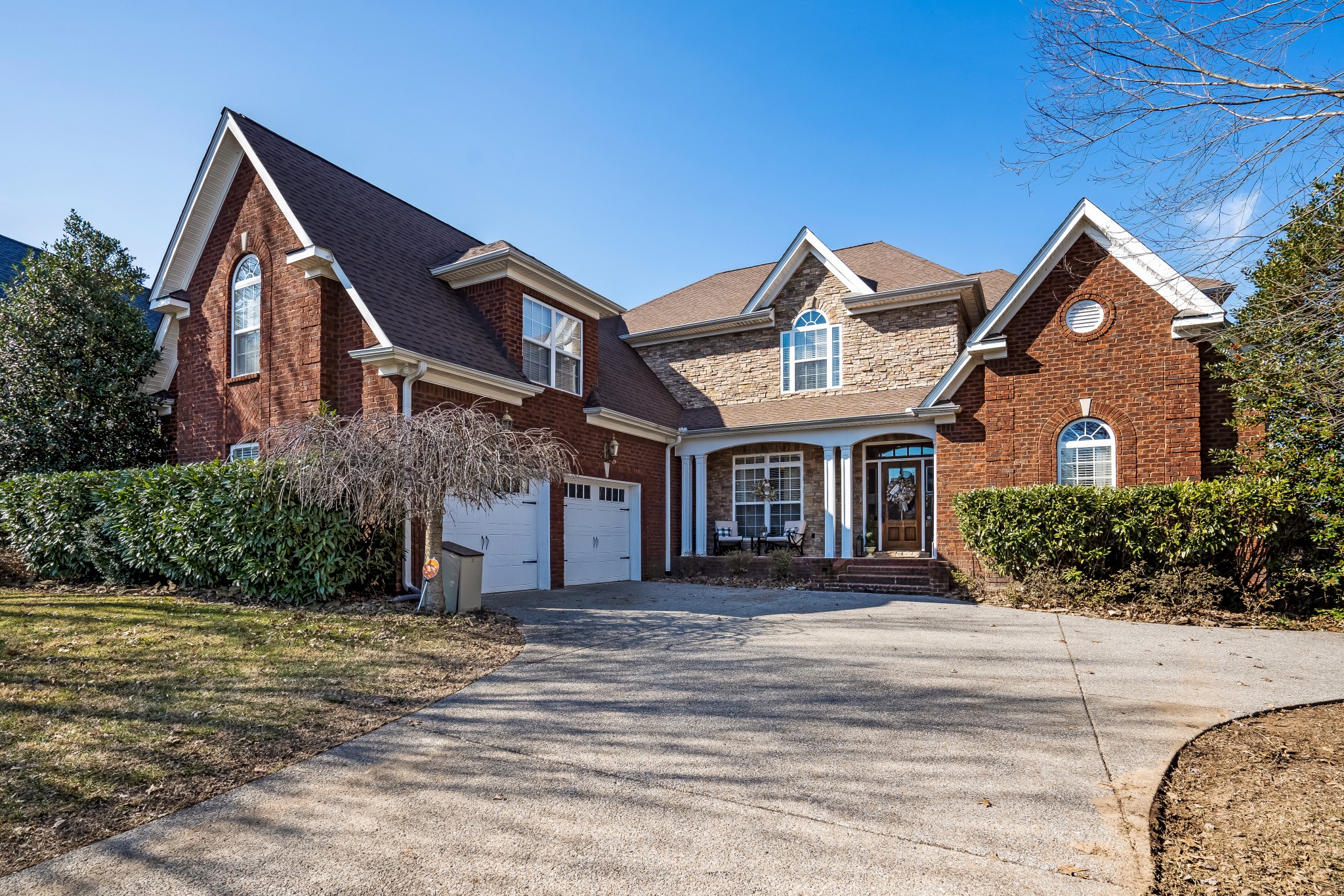 1629 Fair House Road Spring Hill, TN 37174 - Photo 5 of 42 a front view of a house with a yard