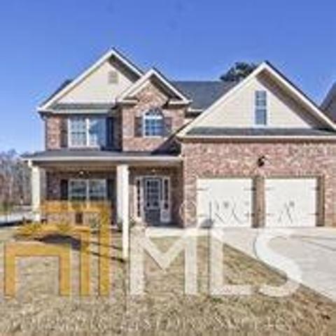 3537 Hancock View, Unit 32 Decatur, GA 30034 - Photo 1 of 1 a view of a white house with large windows and a small yard