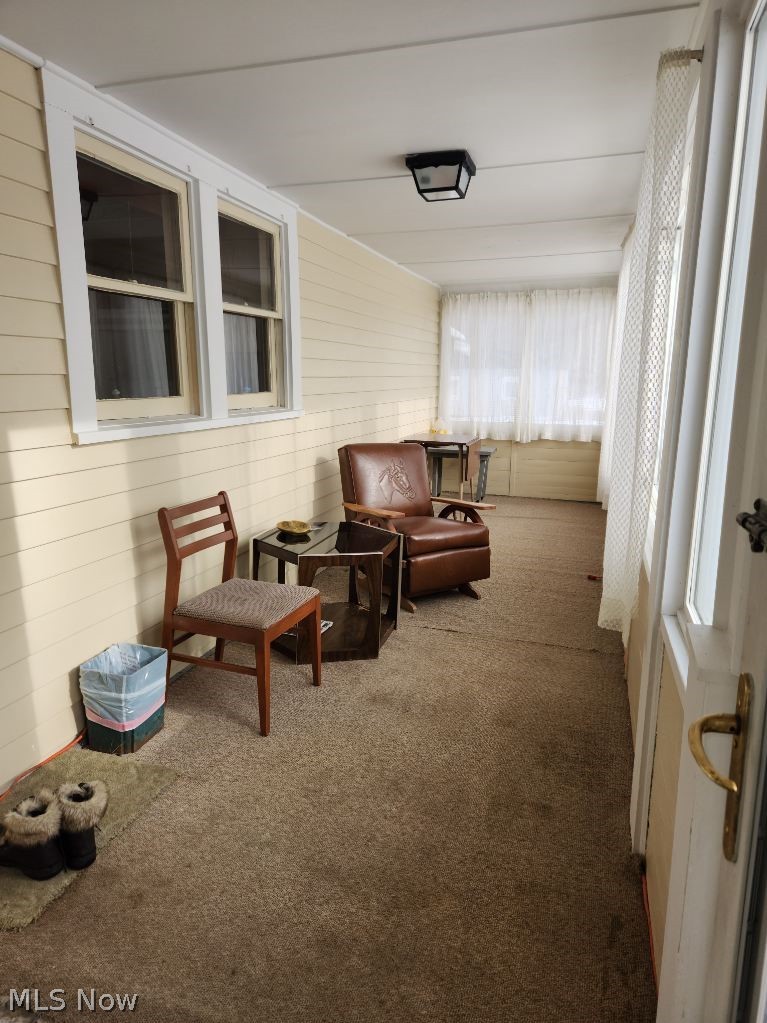 1591 Hubbard Road Madison, OH 44057 - Photo 3 of 9 enclosed porch