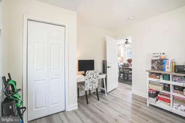 a room with furniture and a book shelf