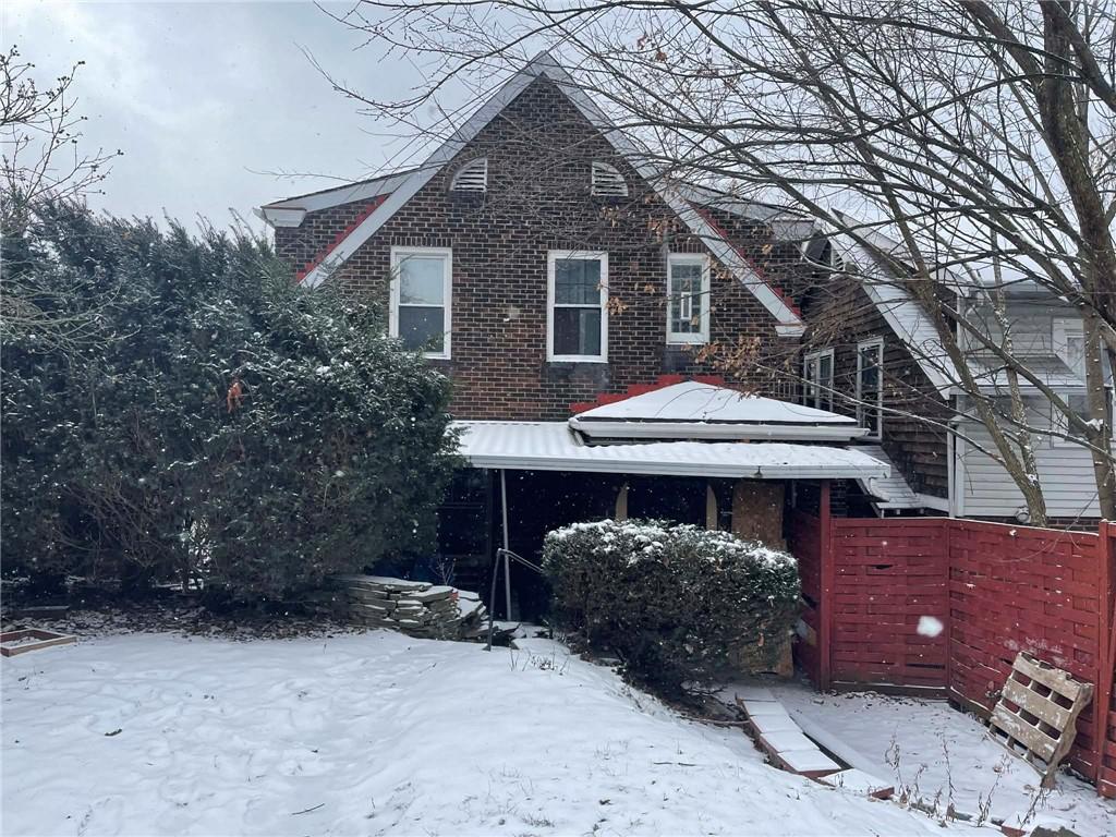 2008 Locust Street Pittsburgh, PA 15218 - Photo 2 of 9 a front view of a house with a yard