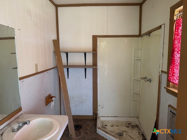 910 County Road 421 Evant, TX 76525 - Photo 22 of 25 a bathroom with a sink toilet and shower