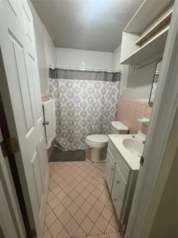 a bathroom with a sink and a toilet