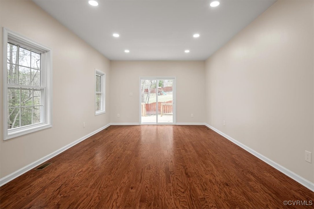 2919 Hog Back Road Hopewell, VA 23860 - Photo 17 of 45 Empty room with dark wood-type flooring, visible v