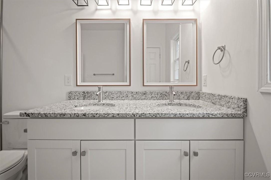 2919 Hog Back Road Hopewell, VA 23860 - Photo 23 of 45 Full bath featuring double vanity, a sink, and toi