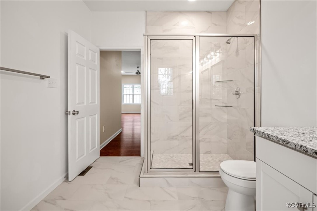 2919 Hog Back Road Hopewell, VA 23860 - Photo 24 of 45 Bathroom with a shower stall, vanity, toilet, marb