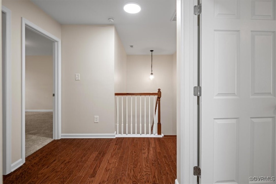 2919 Hog Back Road Hopewell, VA 23860 - Photo 26 of 45 Corridor featuring baseboards, an upstairs landing