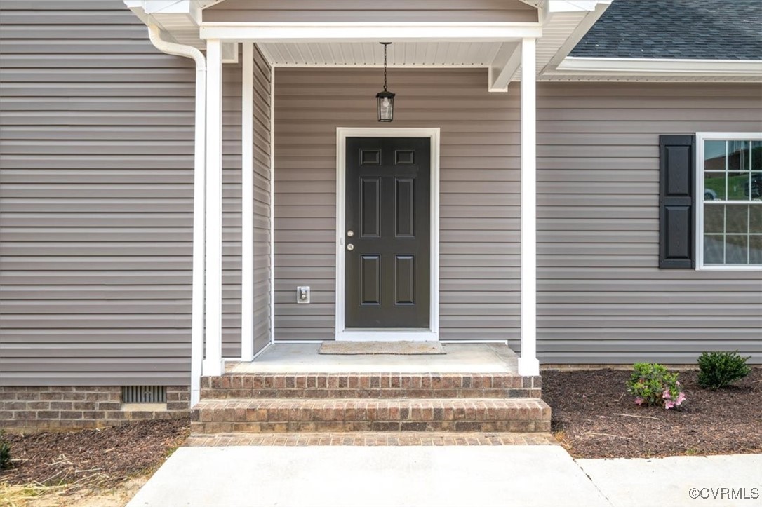 2919 Hog Back Road Hopewell, VA 23860 - Photo 3 of 45 Doorway to property featuring a shingled roof